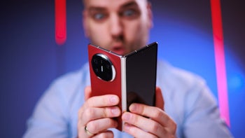 A person holding the Huawei Mate X6.