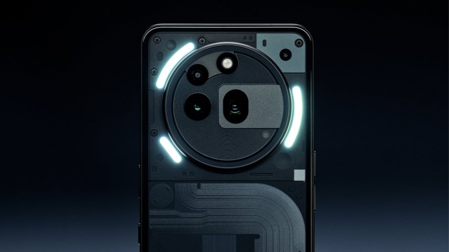 A close-up of the back of a Nothing Phone (3a) Pro showing its unique transparent design and illuminated Glyph Interface.
