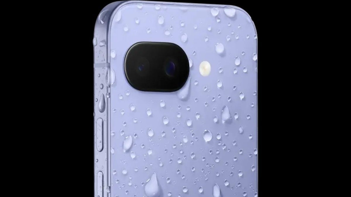 A render of the Pixel 9a in a purple color shown with water droplets on it.