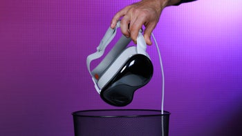 Apple Vision Pro headset on a purple background.