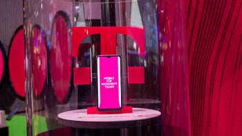 T-mobile logo with a smartphone in front of it