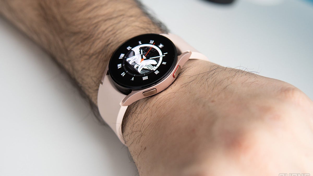 A close-up of a Galaxy Watch 4 on a wrist.