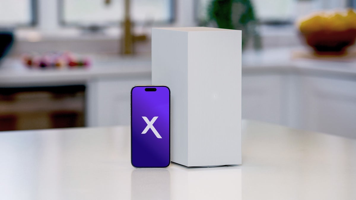 Image with smartphone displaying the Xfinity Mobile logo