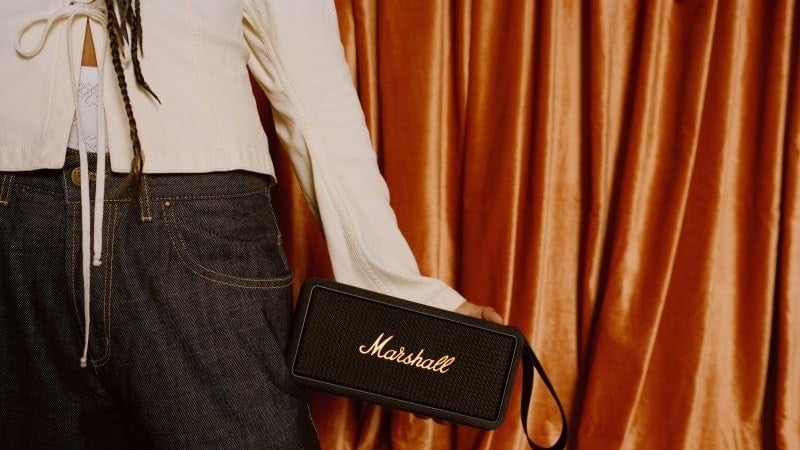 A person holding a Marshall Middleton.