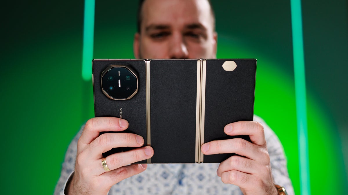 The tri-foldable Huawei Mate XT is opened showing off the width of the device.