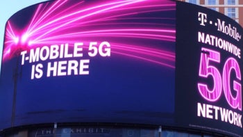 A didital billboard announces the arrival of T-Mobile's nationwide 5G service.