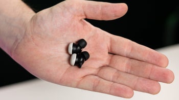 Google Pixel Buds Pro 2 in a person's palm.