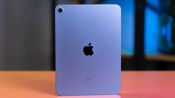 A 10th Gen iPad on a table showcases its rear design with the iconic Apple logo.