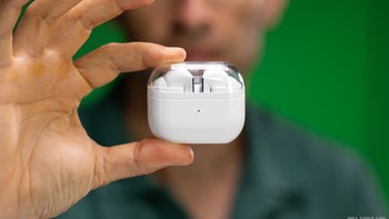 A person holding the Galaxy Buds 3 Pro case.