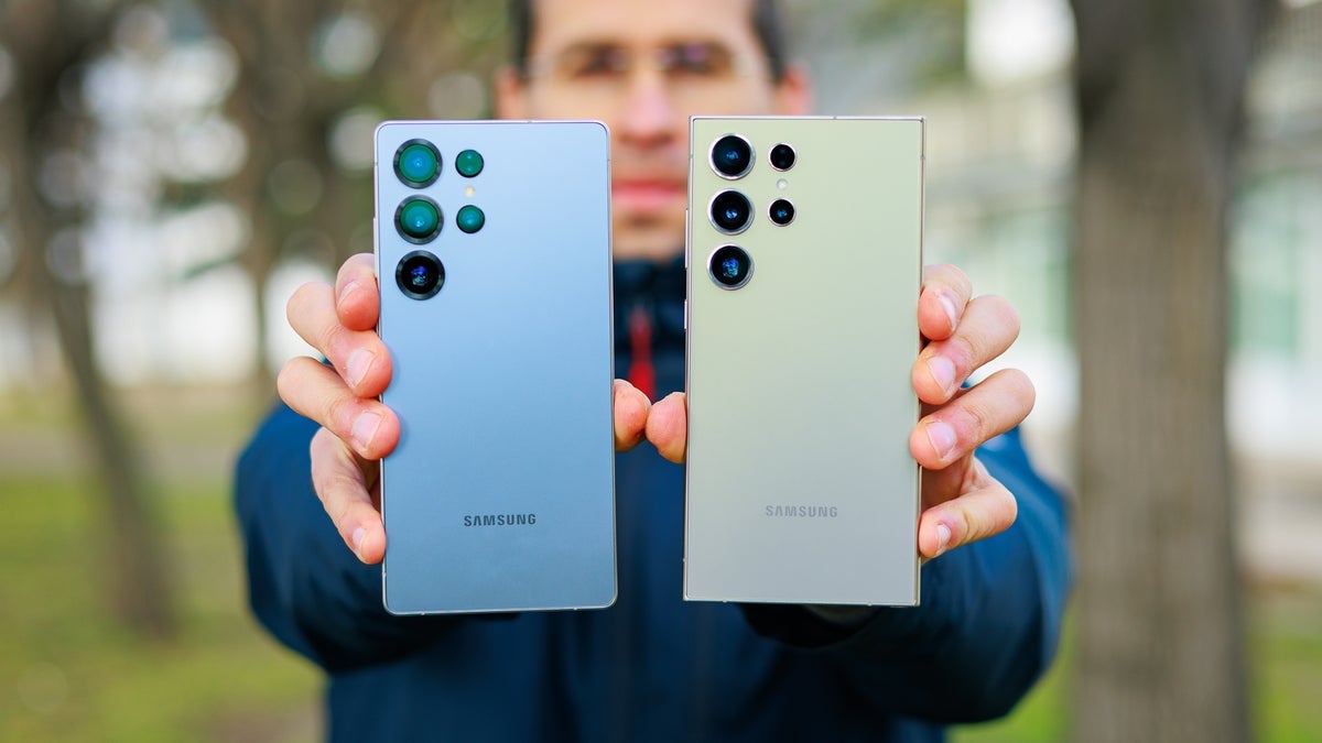 The Galaxy S24 and S25 Ultra held by a person.