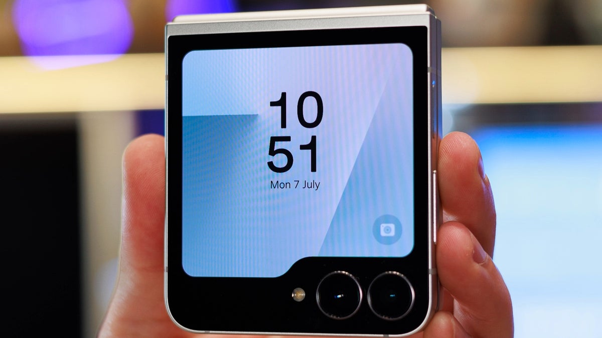 A photo of a Galaxy Z Flip 7 FE held in a hand.