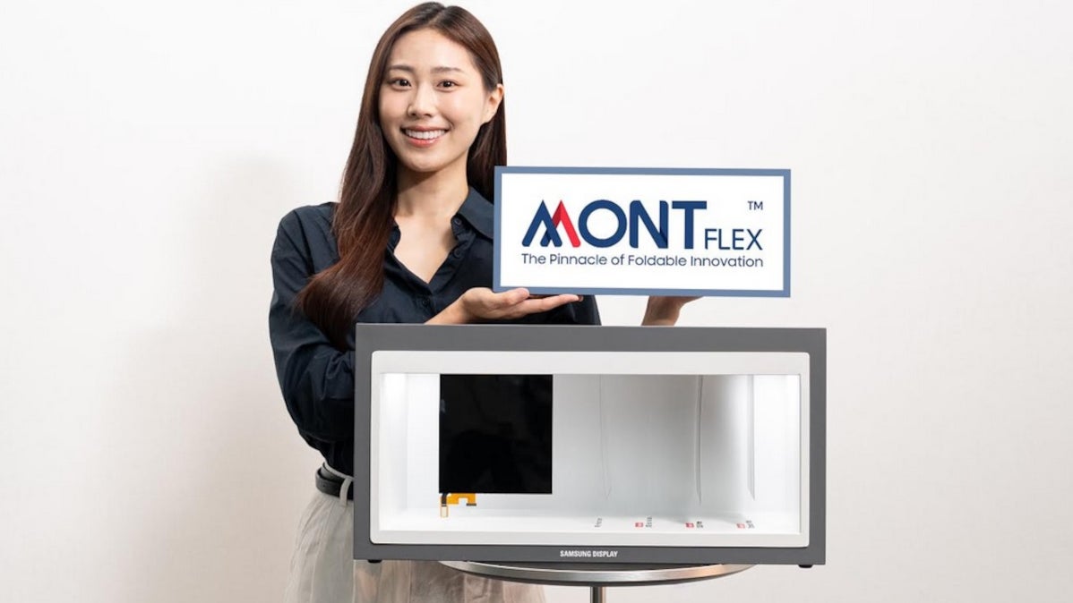 Model stands next to a promo for Samsung Display's MONTFLEX foldable OLED displays.