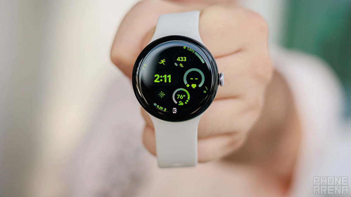 A person holding the Pixel Watch 3 in their hand.