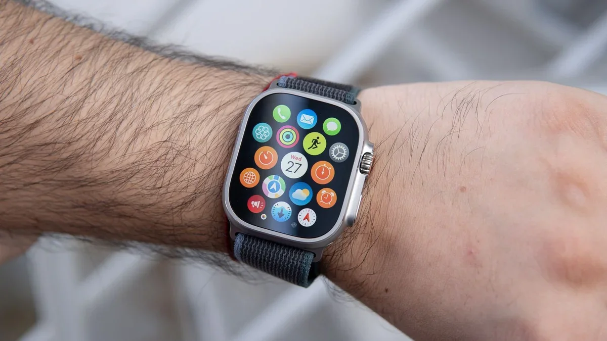 A close-up of an Apple Watch 2 on a wrist.