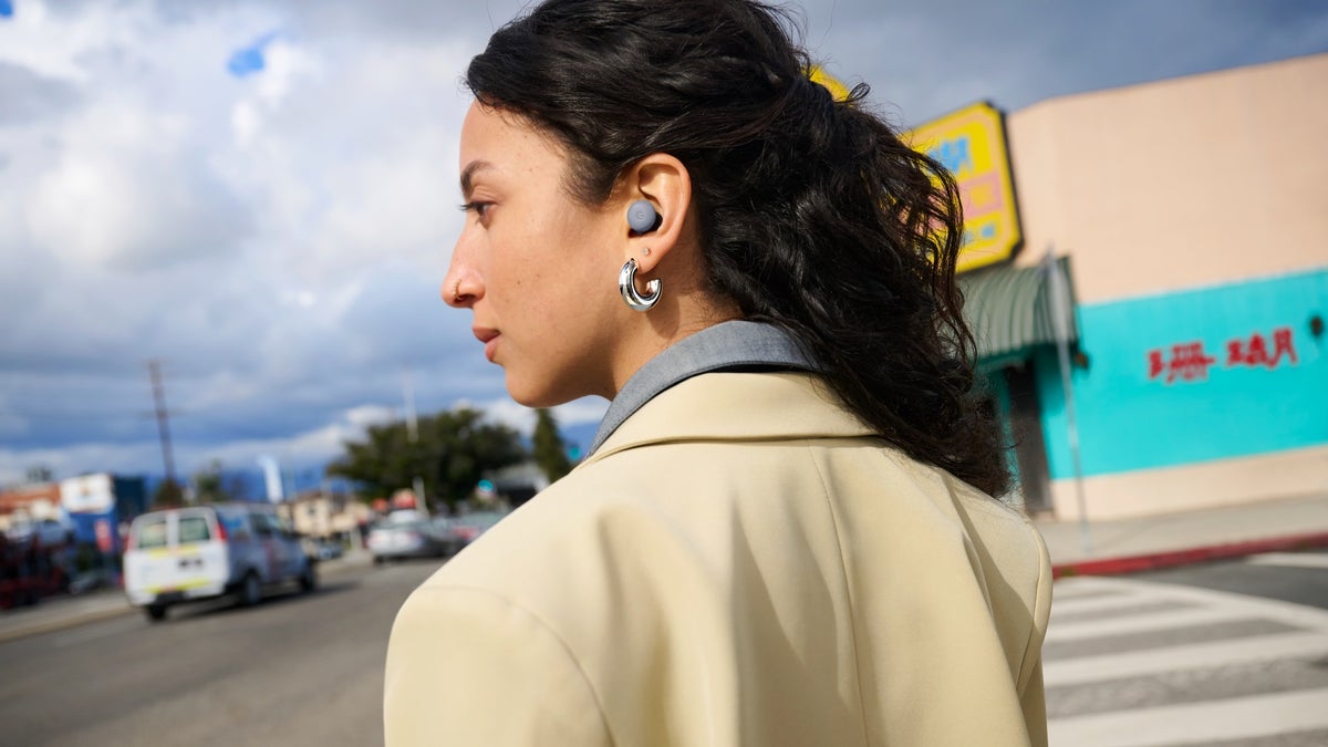 Image of woman wearing Pixel Buds Pro 2 in Moonstone