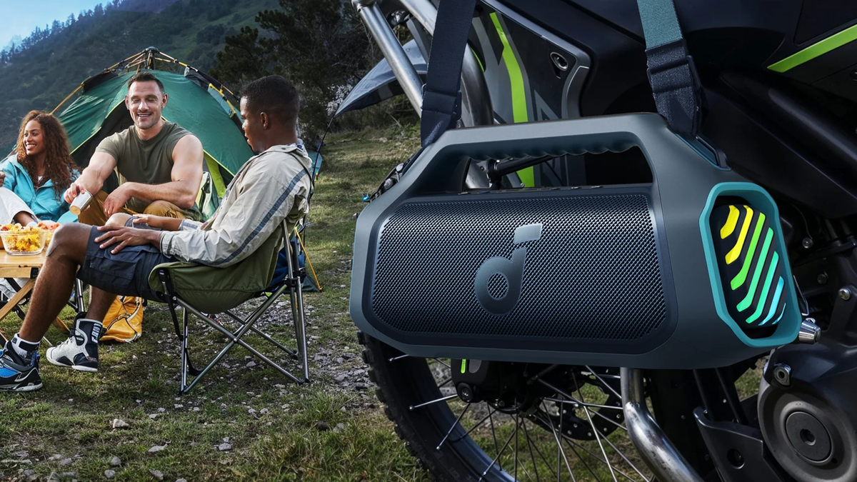 Soundcore Boom 2 Plus placed on a bike or vehicle while people are having fun nearby.