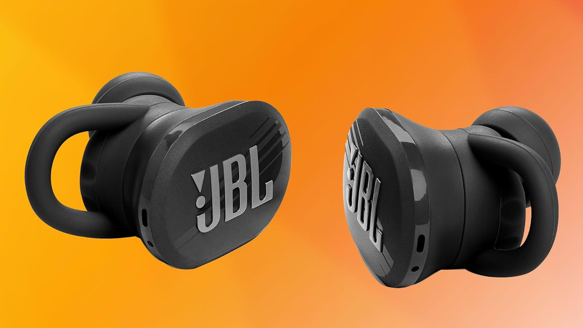 JBL Endurance Race TWS earbuds on an orange background.