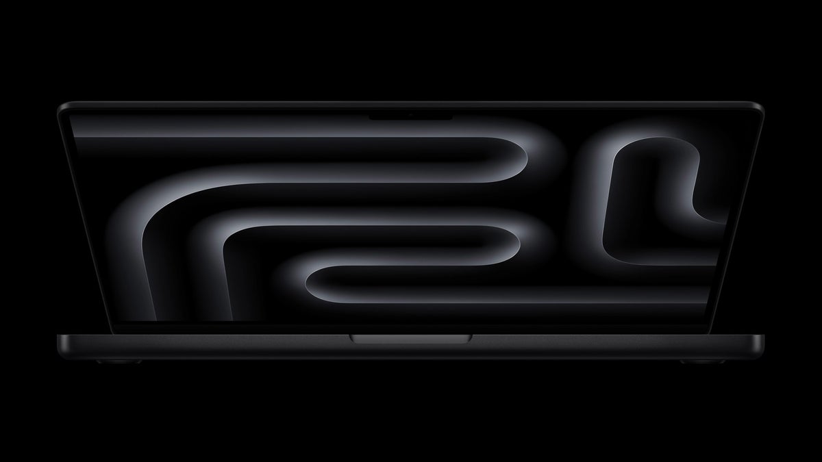 A dark image with MacBook Pro on it.