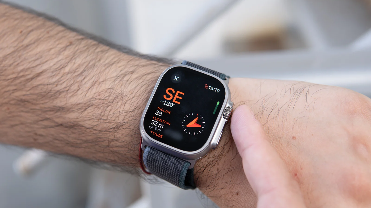 A person wears the Apple Watch Ultra 2 and interacts with it.