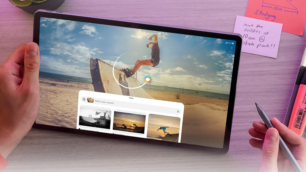A person interacts with the Lenovo Idea Tab Pro tablet and stylus, using Circle to Search.