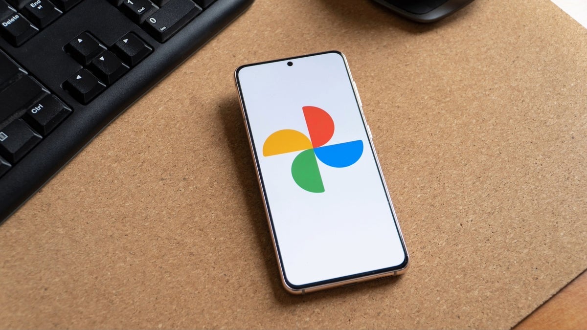 The Google Photos icon is seen on the display of an Android phone.