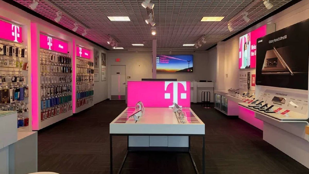 Image shows inside of a T-Mobile store.