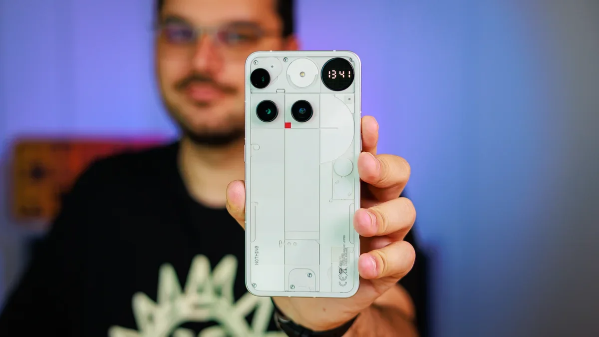 A person holding a Nothing Phone (3)