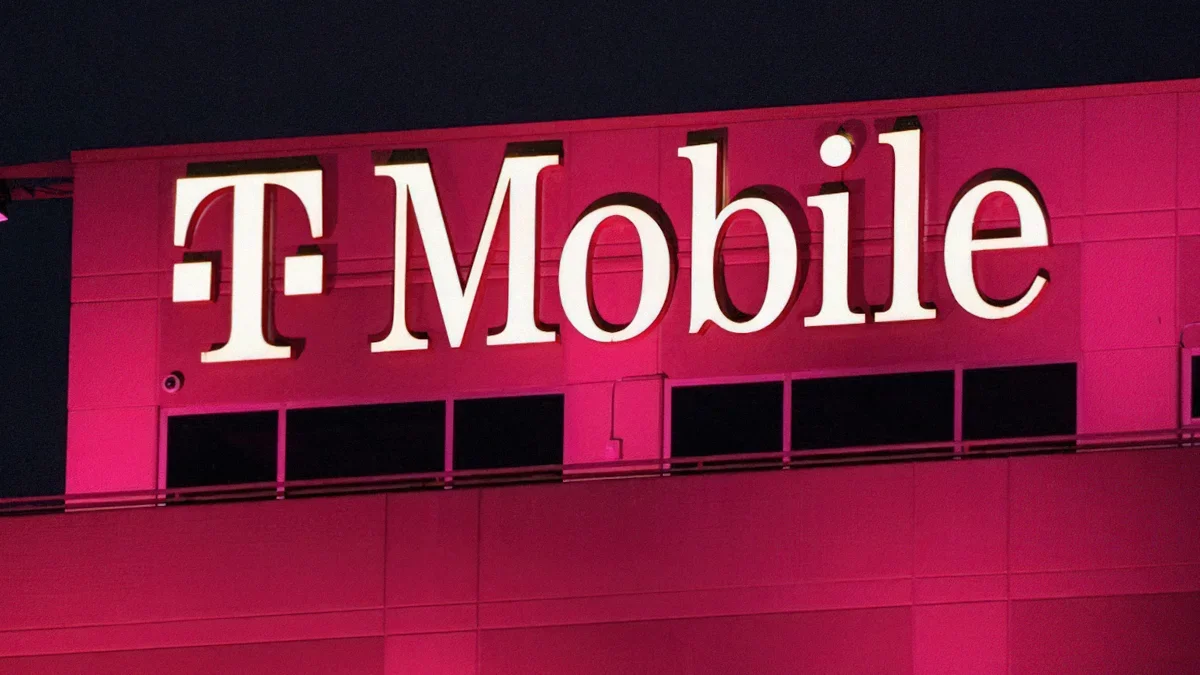 T-Mobile logo on a building at night.