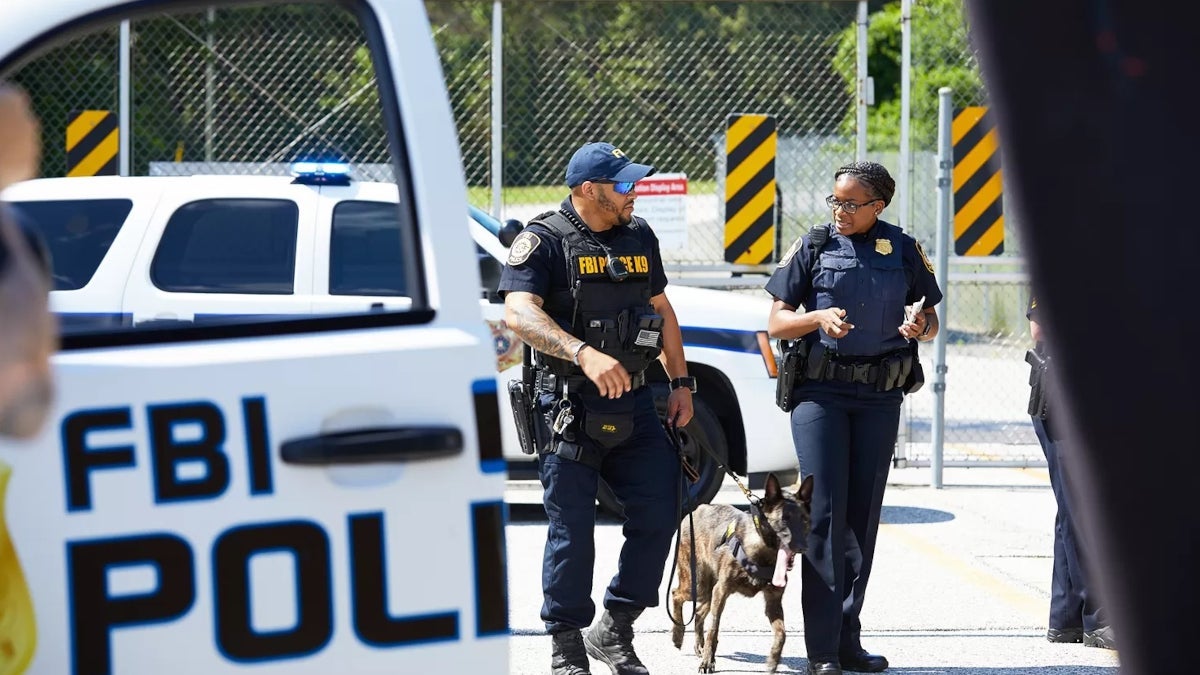 FBI appears at the scene of a crime.