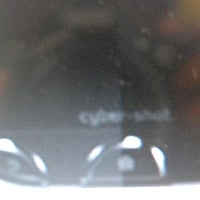 Murky images of a touchscreen Sony Ericsson Cyber-shot phone leak, possibly Android