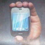 HP shows off the petite size of the Veer 4G on the back of the New York Times