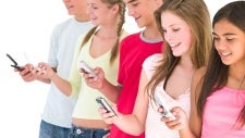 Nielsen says teens talk less, text more and watch the most videos