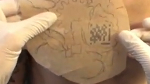 French man gets QR code tattooed to his body
