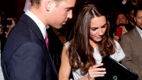 The royal couple gets to play with the HP TouchPad, accepts two as non-profit donation