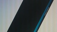 Windows Phone-flavored Nokia 703 leaks out, blurry cam pictures test our detective abilities