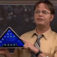 Dwight Schrute from "The Office" talks up a triangular tablet in a hilarious Dunder Mifflin skit