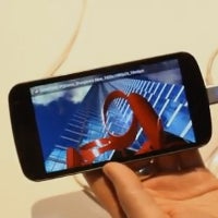 Samsung Galaxy Nexus can grant its whole screen if an app requests it, hiding away the on-screen keys