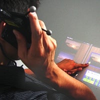 Interact with your phone's screen and share presentations via a pico projector while talking
