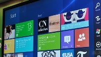Microsoft demoes Windows 8 pre-beta at CES, more customization and new media players in tow