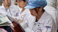 Apple starts issuing monthly reports on excessive work hours