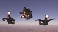 HTC One smartphones taken 12,000 feet in the sky, take photos of models