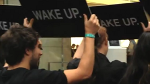 Was RIM behind the "Wake Up" protests outside that Australian Apple Store?