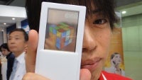 First smartphone with two-sided transparent display gets a prototype, demonstrated in Japan
