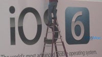 iOS 6 banners being hung at WWDC