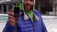 Watch Sony Xperia active used as bait in ice fishing and tied to a snowboard