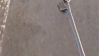 iPhone 4S and Samsung Galaxy S3 dragged behind a car