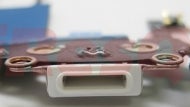 An 8-pin dock connector confirmed in a photo of parts alleged for the next iPhone