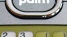 Pictures of Sprint's olive green Palm Centro surface