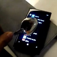 Watch Nokia Lumia 920 sized up with the iPhone 5, and operated with a spoon