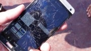 HTC One vs iPhone 5 drop test results in broken glass, shattered dreams